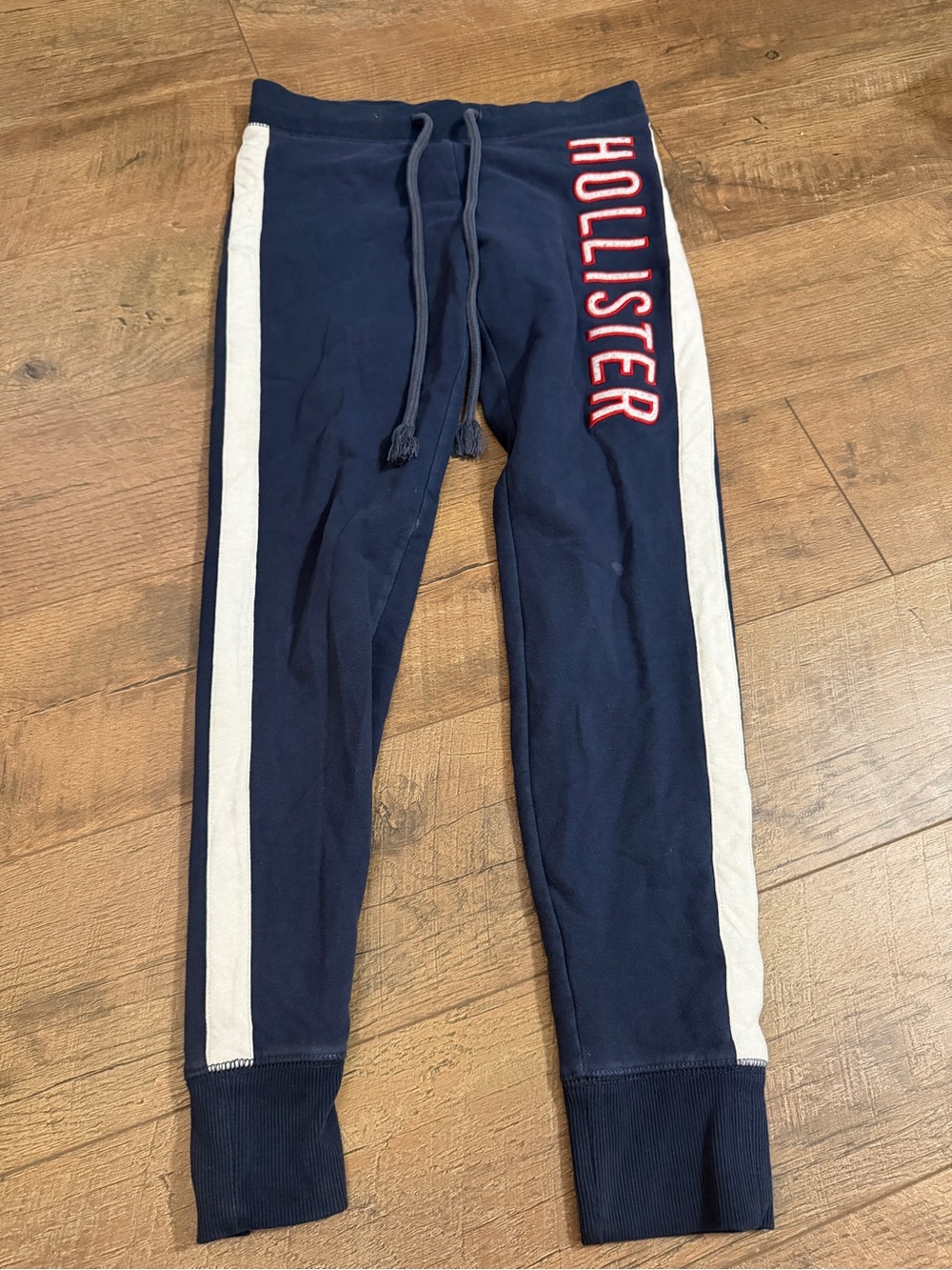 Vintage Hollister Navy Joggers with White Side Stripes and Red Logo